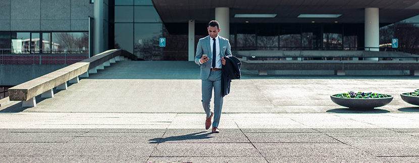 a commercial real estate agent on his phone